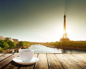 Coffee on Table and Eiffel Tower in Paris