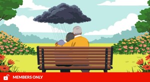 Couple sitting on bench with dark storm cloud above them