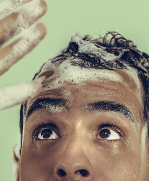 man washing hair discovers hair loss
