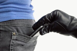 Thief stealing a phone