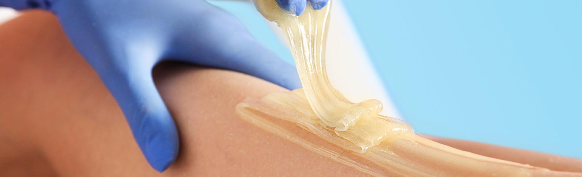 sugaring hair removal on legs