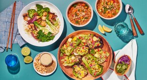 Three plant based recipes on a bright blue background with toppings and napkins