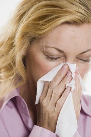 Woman Blowing Nose