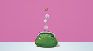 gif of small green coin purse with coins coming out