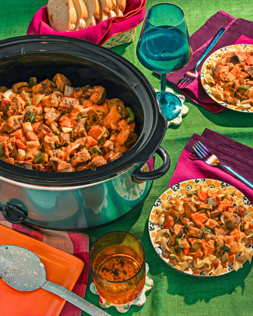 Crockpot meals styled on bright surface