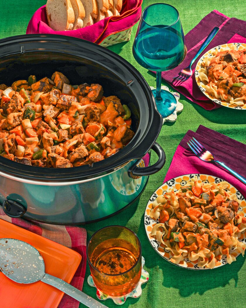 Crockpot meals styled on bright surface