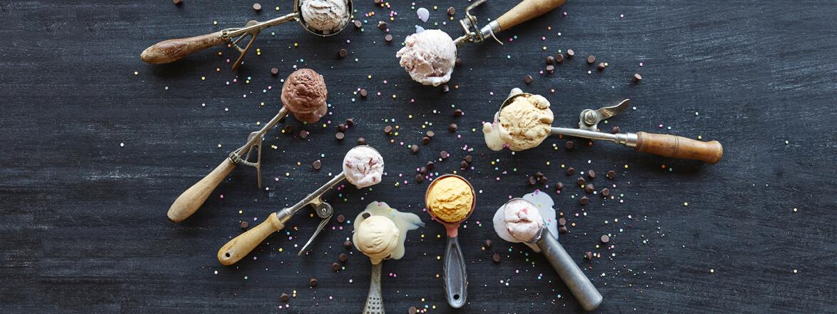 A photo of a group of ice cream scoops holding healthy ice cream.