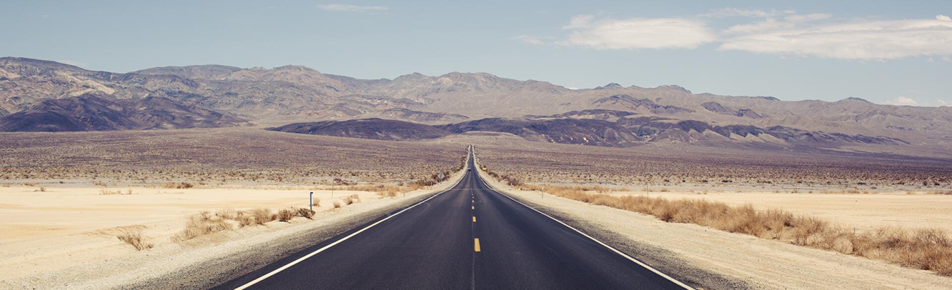 Empty road in the desert representing loneliness.