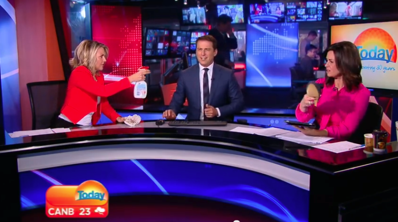Australian News Anchor in Blue Suit