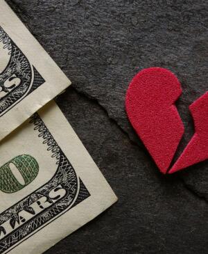 photo concept of heartbreak and saving money