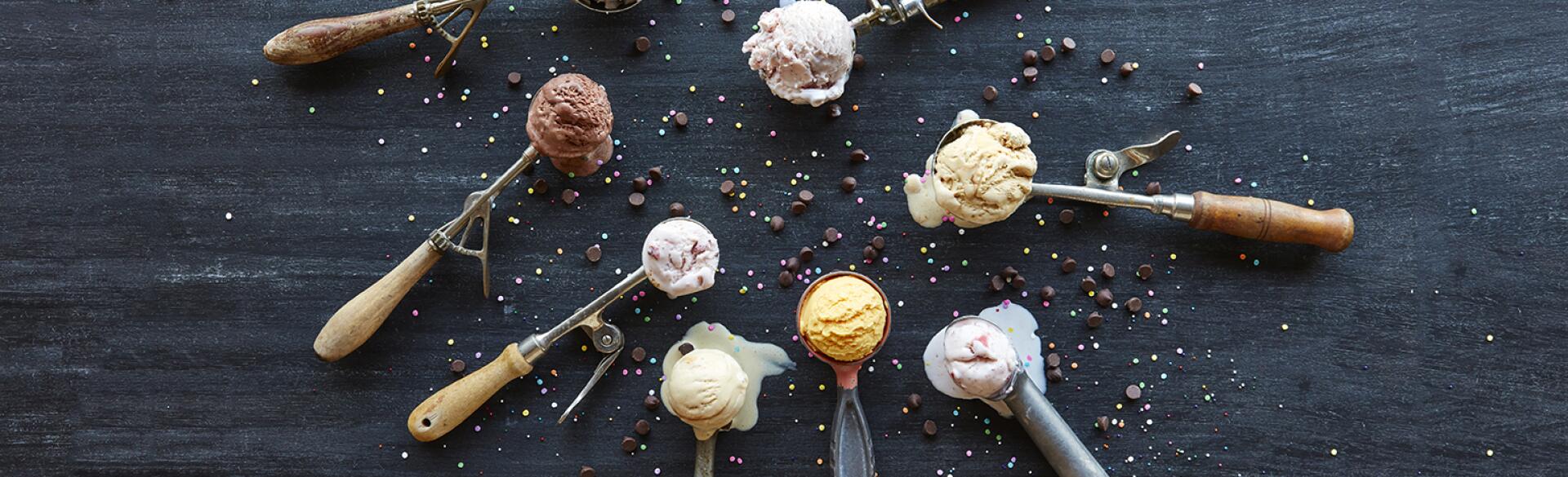A photo of a group of ice cream scoops holding healthy ice cream.