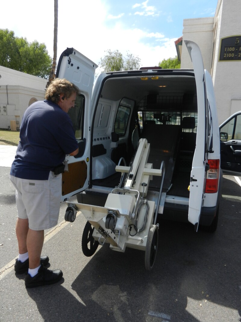 x-ray machine loading into van