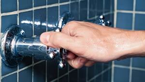 Man turns on the shower