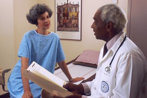 Doctor consults with female patient