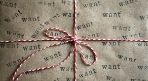 Close Up Of A Wrapped Gift With Homemade Wrapping Paper