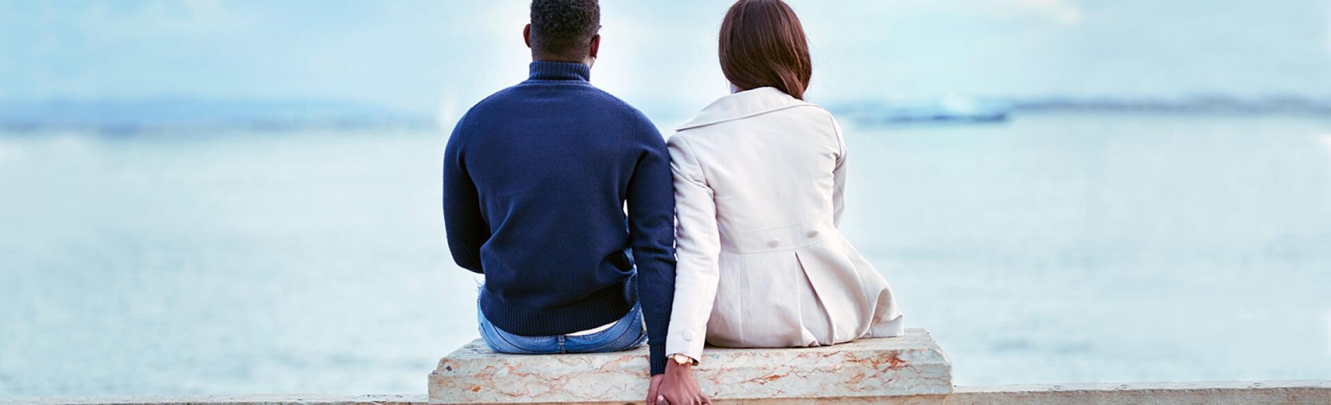 image_of_couple_from_behind_holding_hands_GettyImages-947725718_extension_1540.jpg