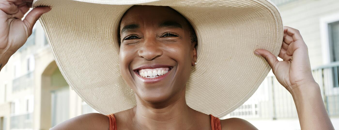 image_of_smiling_woman_in_hat_GettyImages-514408411_1800