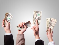 hands giving out money