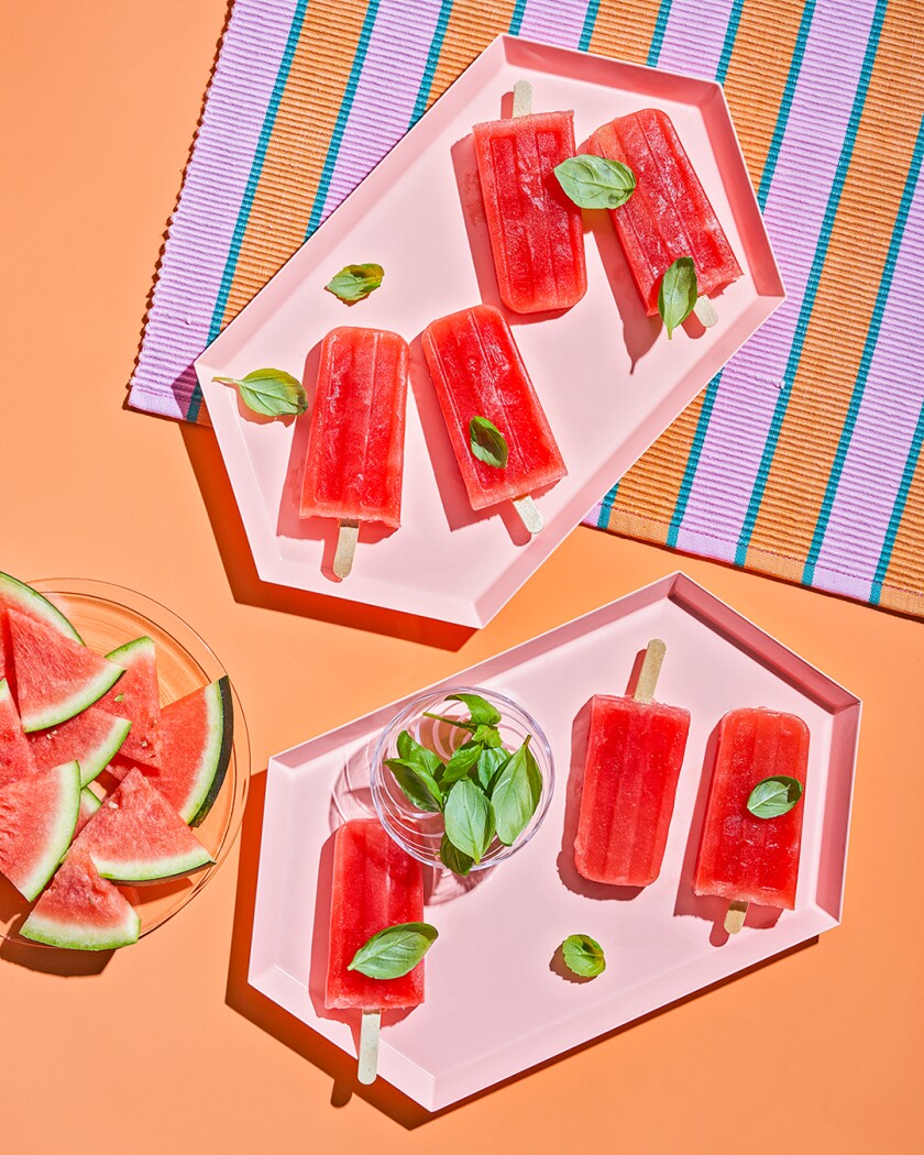 Frozen watermelon and basil popsicles overhead