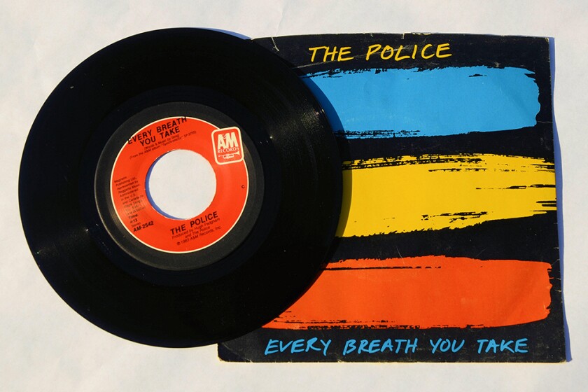 Cover and 45 RPM vinyl record of The Police's song Every Breath You Take released in 1983 by A&M Records.