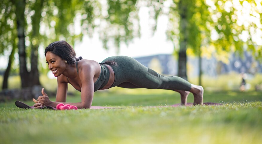 image_of_woman_outside_doing_a_plank_GettyImages-1308285203_1800