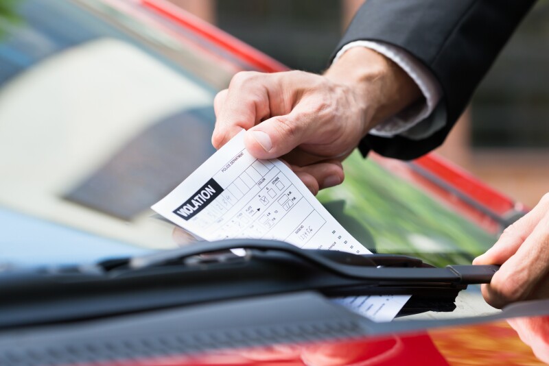 Parking Ticket On Car's Windshield