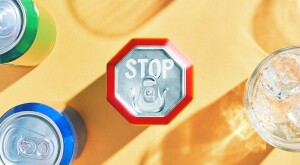 Photo illustration of a soda can shaped as a stop sign