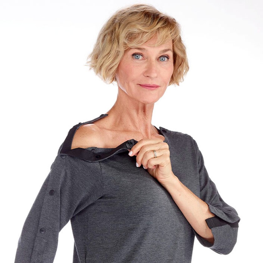 Woman snapping sleeves on a shirt