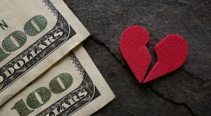 photo concept of heartbreak and saving money