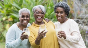 image_of_three_senior_women_smiling_ and_holding_drinks_GettyImages-466376634_1800