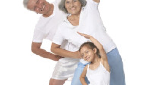 Grandparents with little girl Exercising On White Background