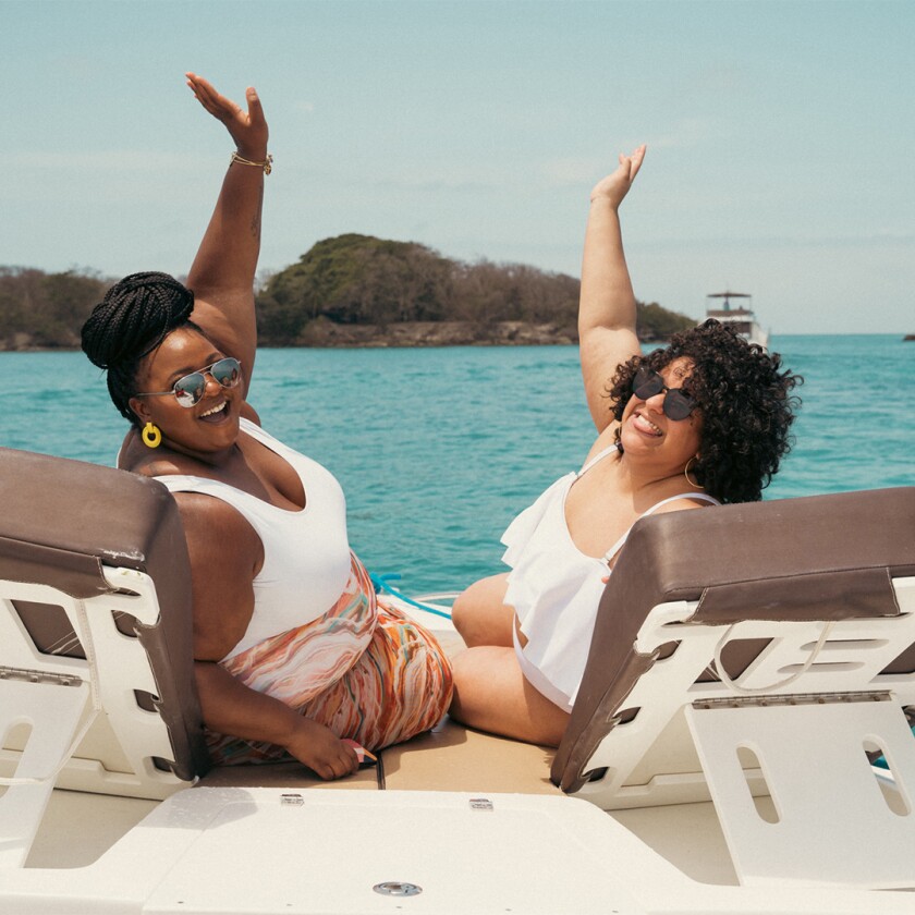 Two women on a boat on vacation
