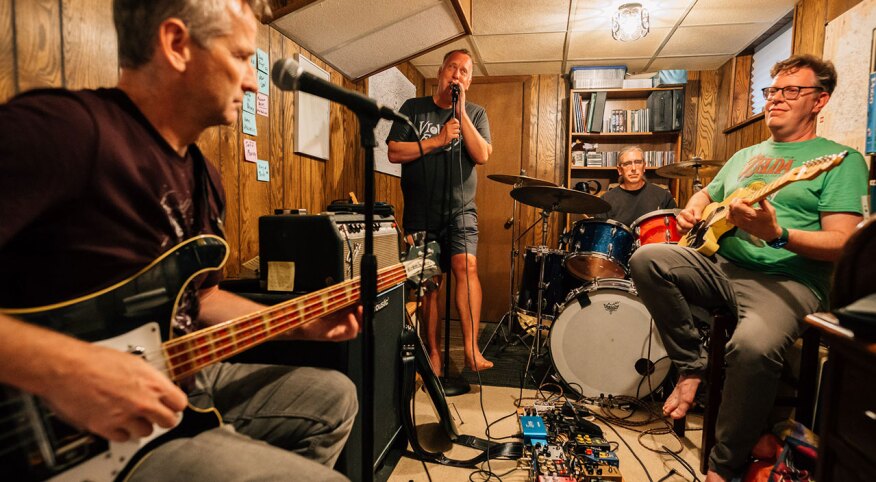 Group of dads having a band jam session