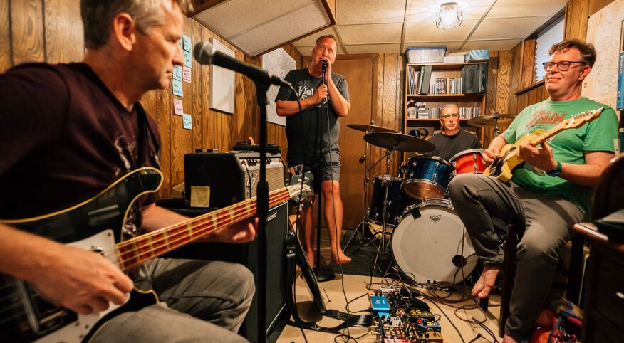 Group of dads having a band jam session