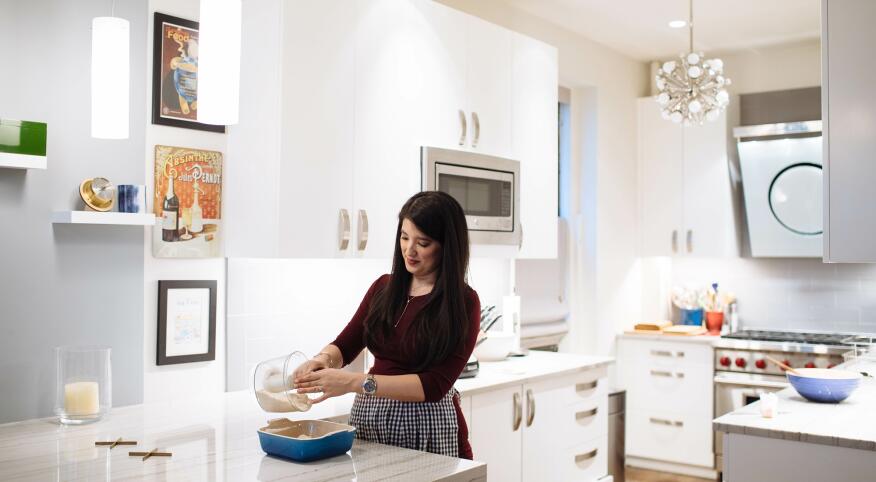 Woman Baking In Contemporary Kitchen