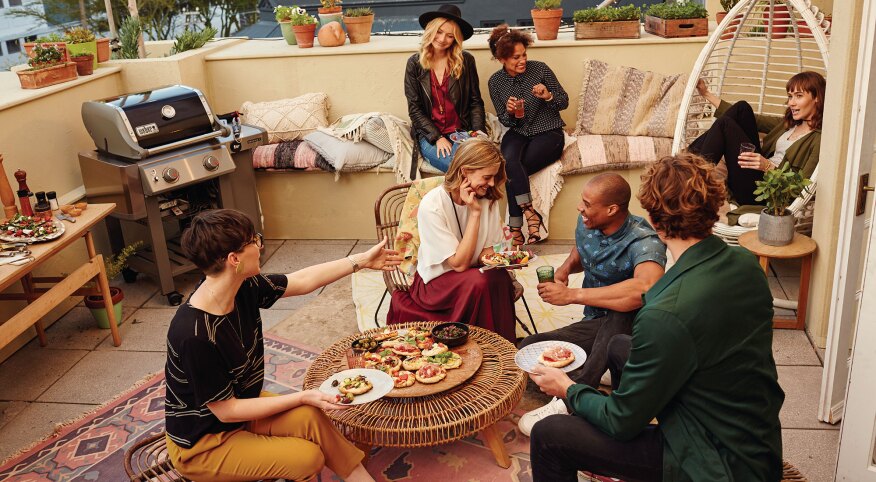 Group of friends hanging out on a patio