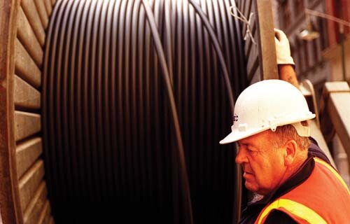 fiber-optic roll-out with worker