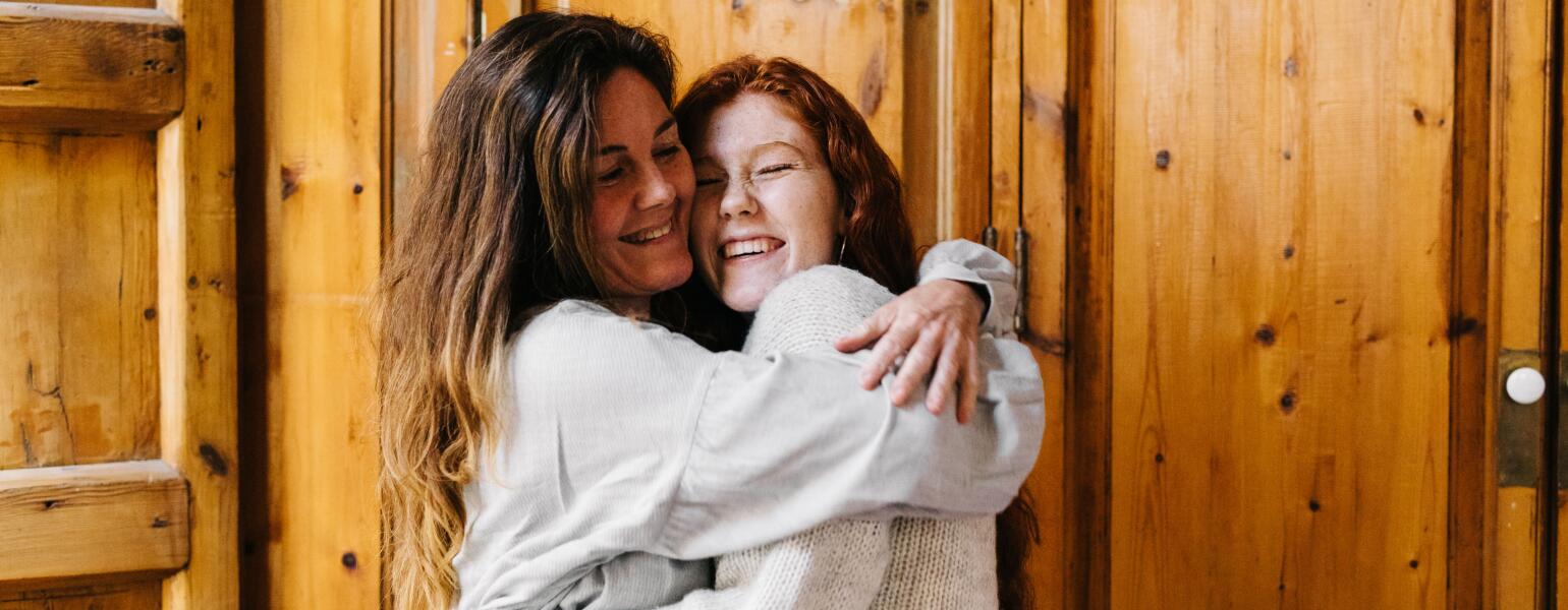 Mother and Daughter embracing
