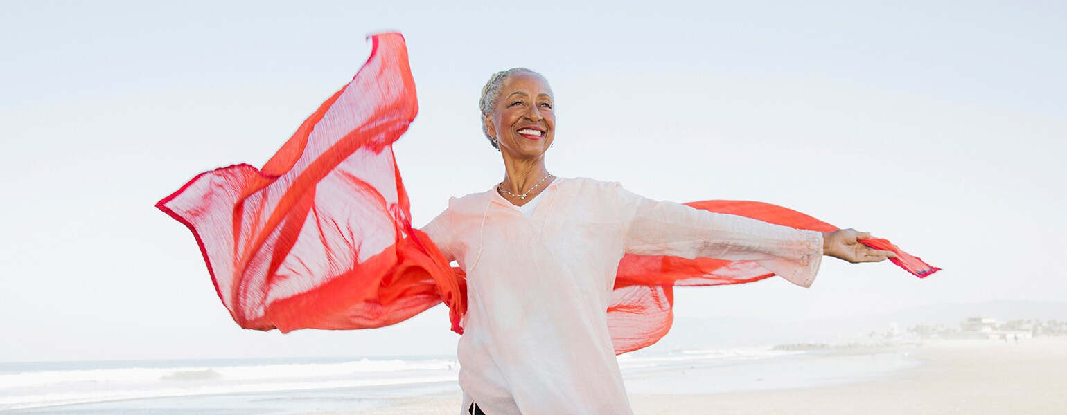 image_of_mature_black_woman_on_beach_GettyImages-905548586_1540.jpg