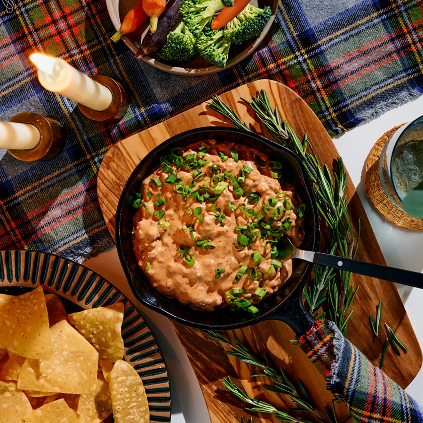 View of four easy appetizers with wintery plaid background