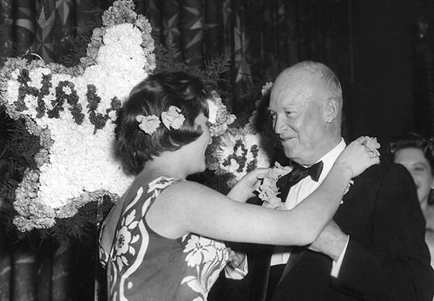 President Dwight D. Eisenhower receives lei in celebration of Hawaii Statehood