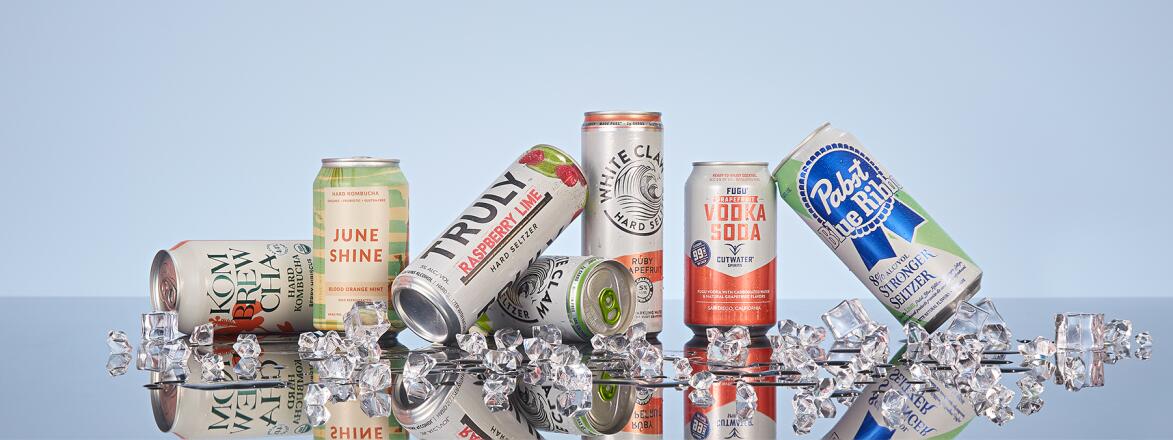 A group of hard seltzer cans on ice