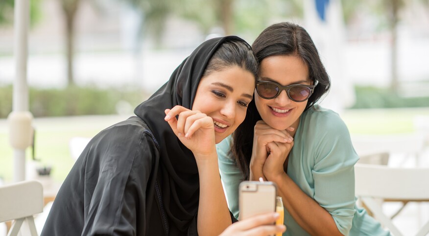 A picture of two sisters next to each other.