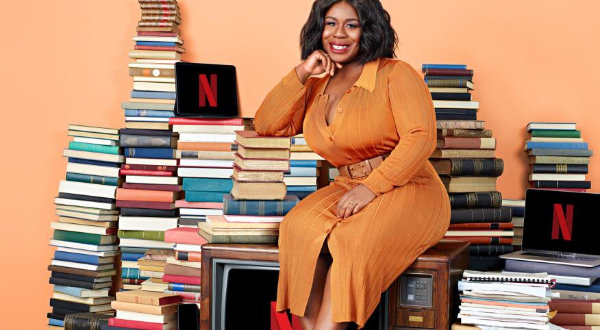 image_of_UzoAduba_sitting_on_books_for_Netflix_Book_Club_NetflixBookClub-Peach_19'6_x48-Final_RGB_CROP_1800.jpg