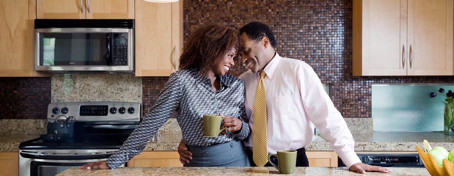 image_of_black_couple_touching_foreheads_in_kitchen_GettyImages-91497683_1540.jpg