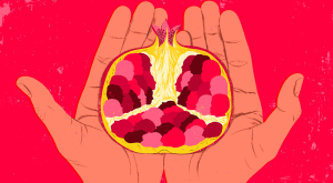 illustration of hands holding an open pomegranate with female faces as the sides