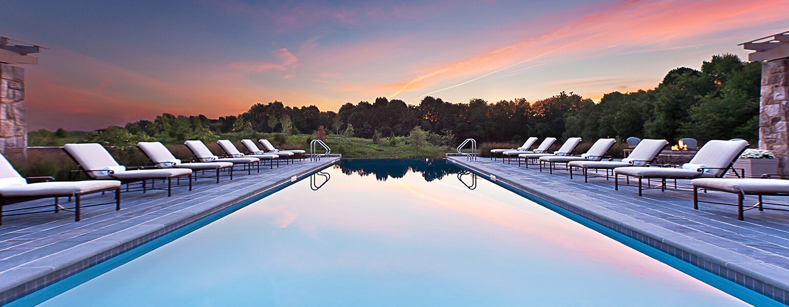 A photo of an in-ground pool at a luxury spa.