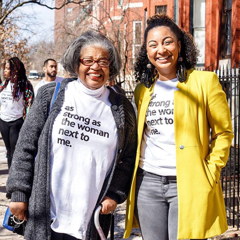 Women wearing matching t-shirts