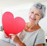 women holding heart