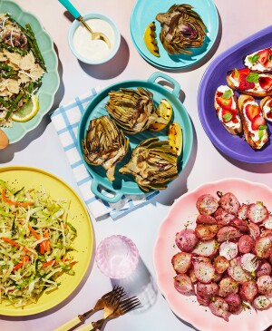 Colorful healthy spring recipes including radishes, artichokes, pasta organized on a beautiful background